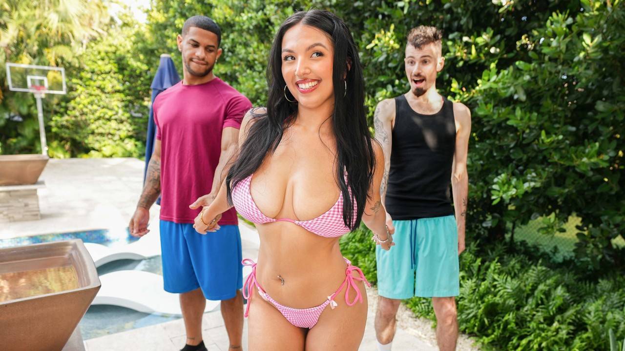 Ravyn Moore - walking outdoors in pink bikini with two men by pool - HornySimp