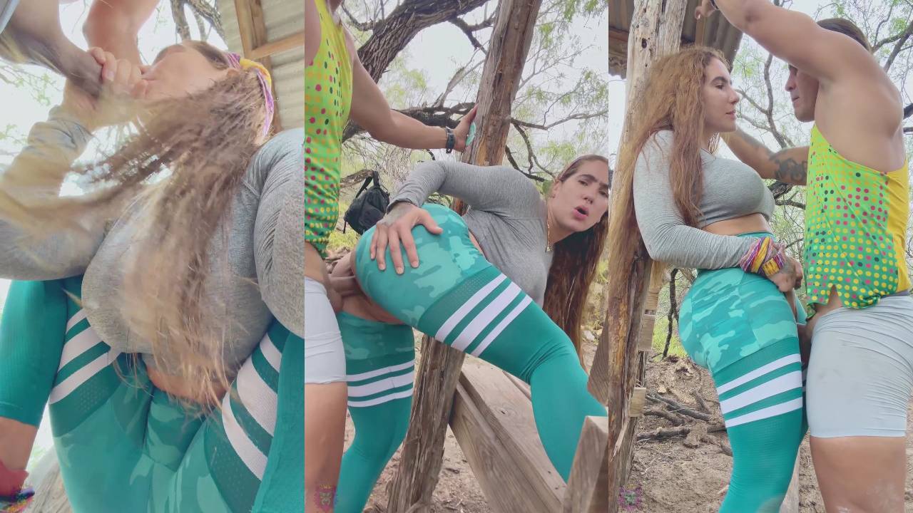 Yiny Leon in teal camo leggings having outdoor standing sex in a jungle setting.